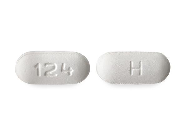 Pill H 124 White Capsule/Oblong is Emtricitabine and Tenofovir Disoproxil Fumarate