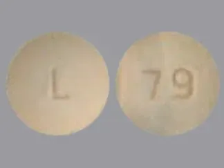 Pill L 79 Beige Round is Nebivolol Hydrochloride