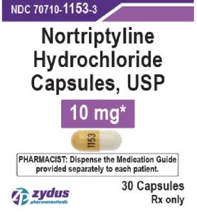 Pill 1153 Orange & White Capsule/Oblong is Nortriptyline Hydrochloride