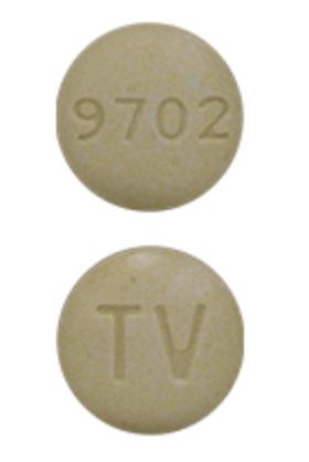 Pill TV 9702 Yellow Round is Carbidopa and Levodopa