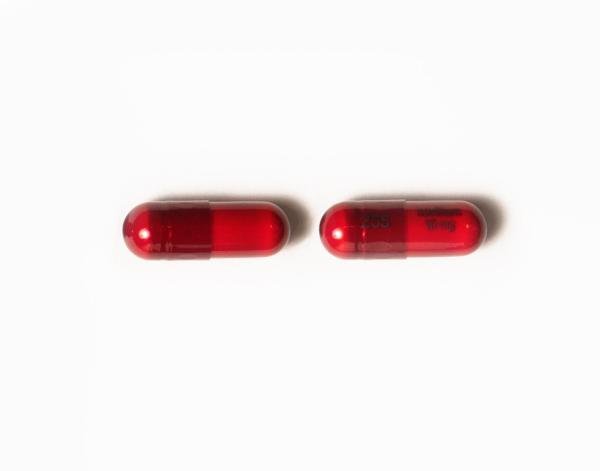 Pill 255 novitium 10 mg Red Capsule/Oblong is Methyltestosterone