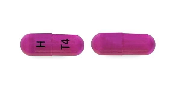 Pill H T4 Purple Capsule/Oblong is Trientine Hydrochloride