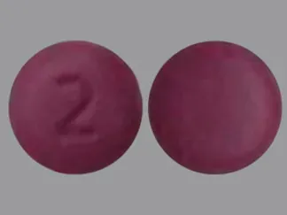 Pill 2 Purple Round is Hydroxyzine Hydrochloride