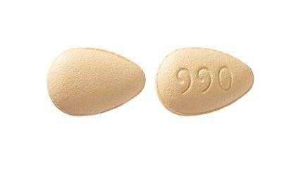 Pill 990 Orange Egg-shape is Tadalafil