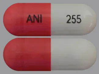Pill ANI 255 Gray & Red Capsule/Oblong is Acebutolol Hydrochloride