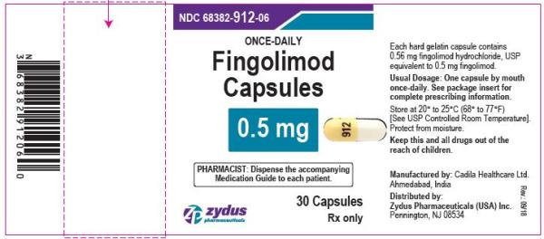 Pill 912 Yellow & White Capsule/Oblong is Fingolimod Hydrochloride