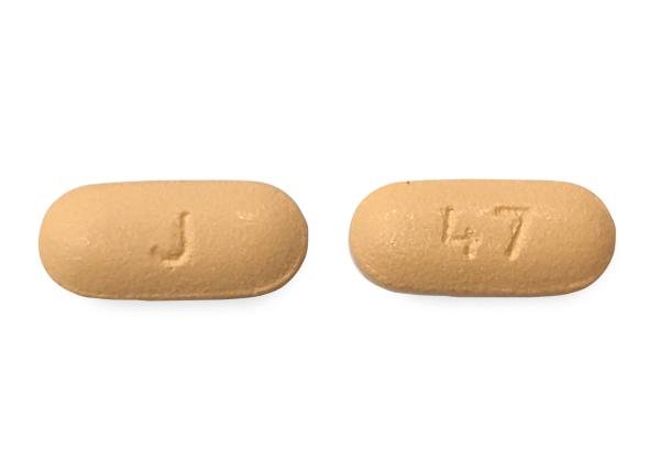 Pill J 47 Tan Capsule/Oblong is Memantine Hydrochloride