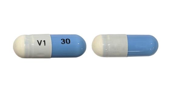 Pill V1 30 Blue & White Capsule/Oblong is Mexiletine Hydrochloride