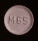 Pill M65 Purple Round is Levothyroxine Sodium