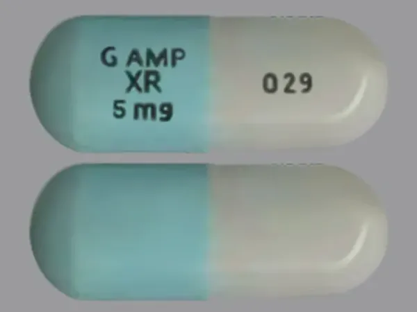 Pill G AMP XR 5 mg 029 Blue & White Capsule/Oblong is Amphetamine and Dextroamphetamine Extended Release
