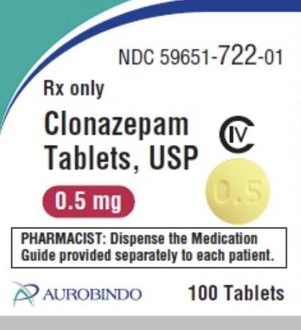 Pill 0.5 Yellow Round is Clonazepam