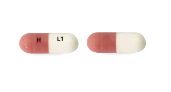 Pill H L1 Pink & White Capsule/Oblong is Lenalidomide