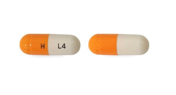 Pill H L4 Orange & White Capsule/Oblong is Lenalidomide