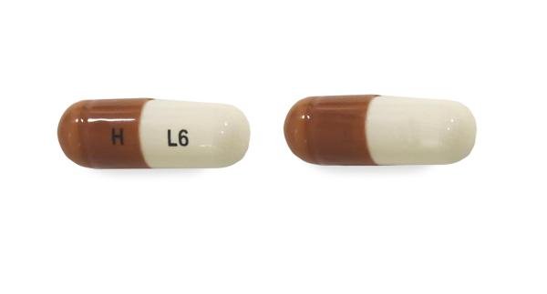 Pill H L6 Brown & White Capsule/Oblong is Lenalidomide