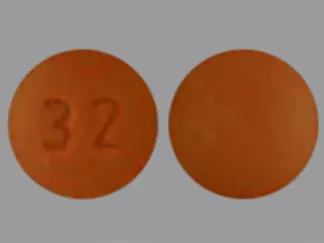 Pill 32 Brown Round is Amitriptyline Hydrochloride