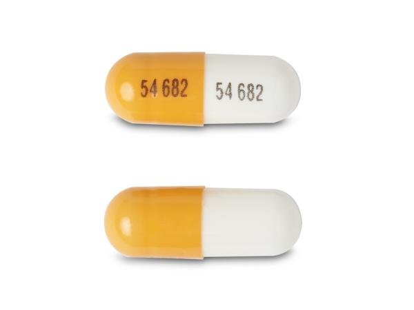 Pill 54 682 54 682 Orange & White Capsule/Oblong is Lisdexamfetamine Dimesylate