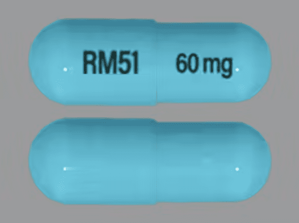 Pill RM51 60 mg Blue Capsule/Oblong is Lisdexamfetamine Dimesylate