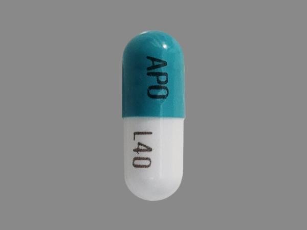 Pill APO L40 Green & White Capsule/Oblong is Lisdexamfetamine Dimesylate