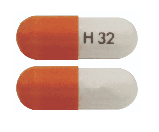 Pill H32 Orange & White Capsule/Oblong is Carvedilol Phosphate Extended Release