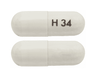 Pill H34 White Capsule/Oblong is Carvedilol Phosphate Extended Release