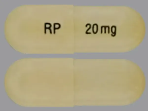 Pill RP 20mg White Capsule/Oblong is Lisdexamfetamine Dimesylate