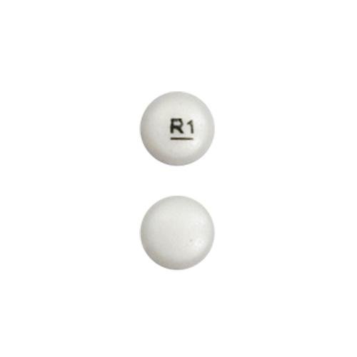 Pill R1 White Round is Tiopronin Delayed Release