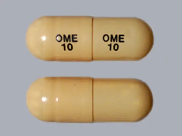 Pill OME 10 OME 10 Brown Capsule/Oblong is Omeprazole Delayed Release