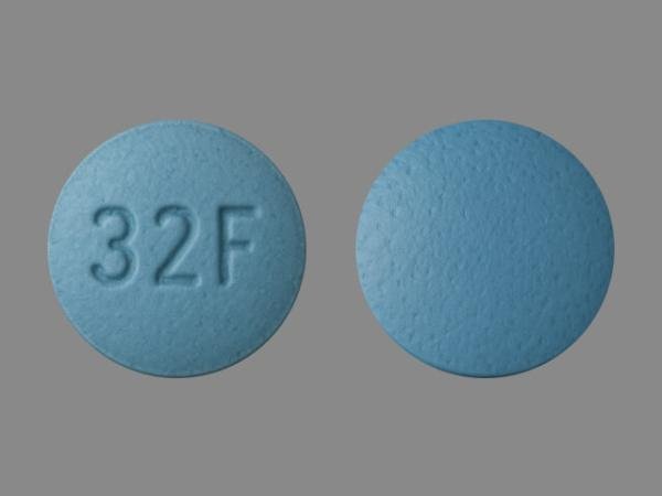 Pill 32F Blue Round is Famotidine
