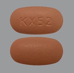 Pill KX52 Peach Oval is Ferric Citrate