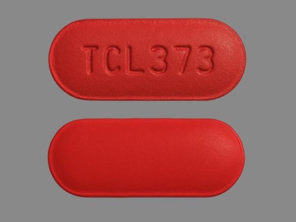 Pill TCL373 Red Capsule/Oblong is Acetaminophen and Caffeine