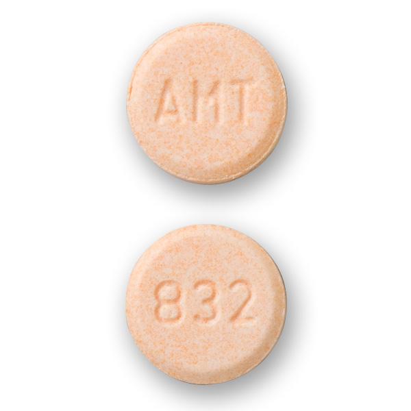 Pill AMT 832 Orange Round is Amantadine Hydrochloride