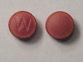 Pill W Brown Round is Azo Urinary Pain Relief