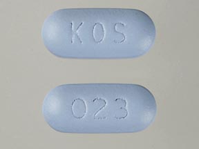 Pill 023 KOS Blue Capsule/Oblong is Simcor