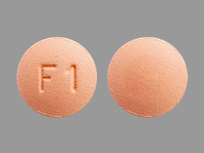 Pill F1 Brown Round is Finasteride