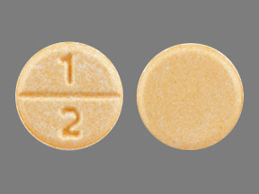 Pill 1 2 Orange Round is Clonazepam