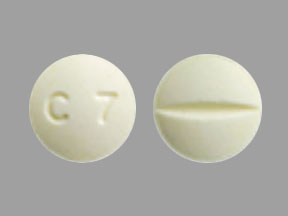 Pill C7 Yellow Round is Doxazosin Mesylate