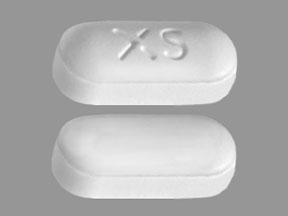 Pill XS White Capsule/Oblong is Nexafed Sinus Pressure + Pain