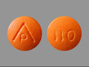 Pill AP 110 Orange Round is Aspirin (Enteric Coated)