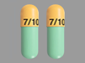 Pill FL 7/10 Green & Orange Capsule/Oblong is Namzaric