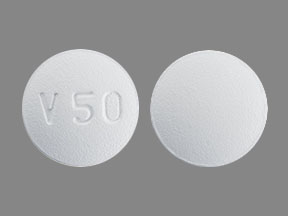 Pill V50  White Round is Voriconazole