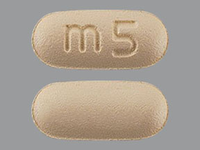 Pill m5 Orange Capsule-shape is Memantine Hydrochloride