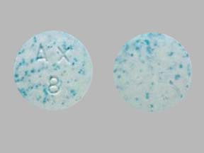 Pill AX8 White & Blue Specks Round is Suprenza