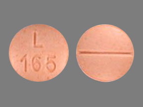 Pill L165 Peach Oval is Clonidine Hydrochloride