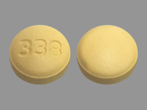 Pill 338 Yellow Round is Tadalafil