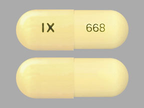 Pill IX 668 Yellow Capsule/Oblong is Acitretin