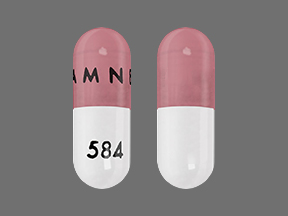 Pill AMNEAL 584 Pink & White Capsule-shape is Temazepam