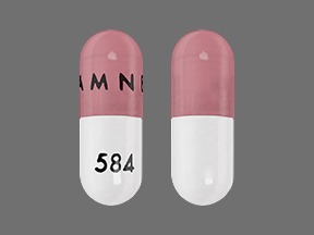 Pill AMNEAL 584 Pink & White Capsule/Oblong is Temazepam