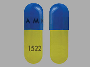 Pill AMNEAL 1522 Blue & Yellow Capsule/Oblong is Tetracycline Hydrochloride