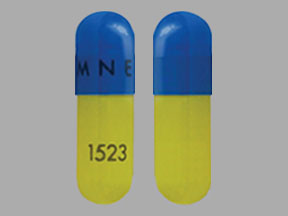 Pill AMNEAL 1523 Blue & Yellow Capsule-shape is Tetracycline Hydrochloride
