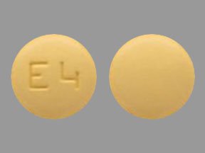 Pill E4 Yellow Round is Fluphenazine Hydrochloride